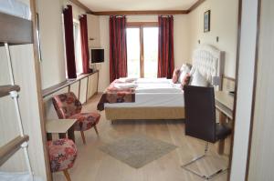 Letto o letti in una camera di Jägerhotel