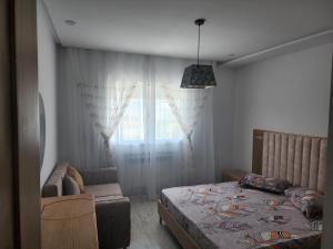 Postel nebo postele na pokoji v ubytování Horizon Appartment - Hammamet Nord + 25 fotografií