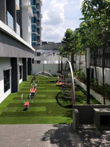 a playground on the side of a building at Netflix # Sky Suite near Jaya One by Salaam Suites, 2 pax in Petaling Jaya