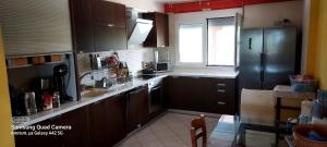 Kuchyňa alebo kuchynka v ubytovaní Koukmaris House