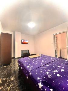 Postel nebo postele na pokoji v ubytování Quantum villa