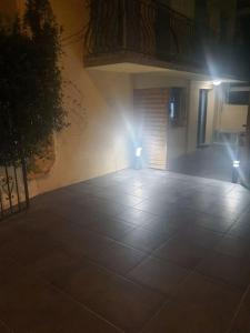 a room with two lights on the side of a building at Superbe appartement avec jacuzzi et extérieur in Perpignan
