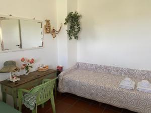 Posteľ alebo postele v izbe v ubytovaní Villa Anna - Appartamento relax 3 minuti a piedi dalla spiaggia