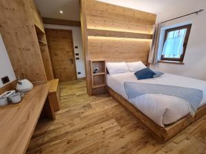 Posteľ alebo postele v izbe v ubytovaní La Culla B&B