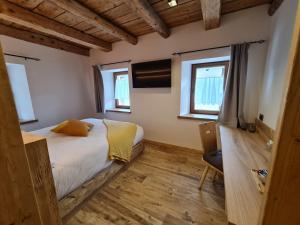 Posteľ alebo postele v izbe v ubytovaní La Culla B&B