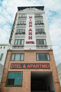 a building with a hotel sign on it at Minh Anh Hotel & Apartment in Hai Phong