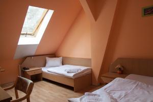 Postel nebo postele na pokoji v ubytování Hotel Aeroplan