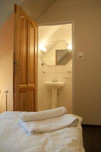 Koupelna v ubytování Hotel Aeroplan