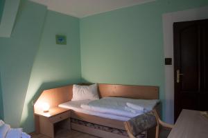 Voodi või voodid majutusasutuse Hotel Aeroplan toas