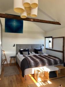 Postel nebo postele na pokoji v ubytování Söndregårds Haväng Bed & Kitchen