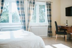 Postel nebo postele na pokoji v ubytování Nadden Hotell & Konferens + 37 fotografií