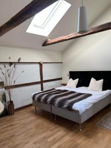 Postel nebo postele na pokoji v ubytování Söndregårds Haväng Bed & Kitchen