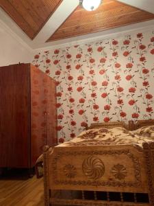 Postel nebo postele na pokoji v ubytování Guest house Mzia
