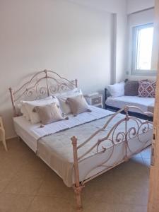 Ένα ή περισσότερα κρεβάτια σε δωμάτιο στο Villa Vanessa
