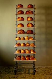 a rack of pastries sitting on top at Là Di Moret in Udine