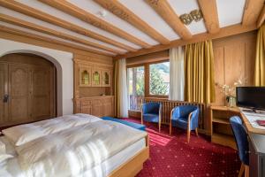 Postel nebo postele na pokoji v ubytování Hotel Hell