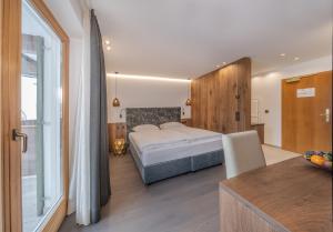 Postel nebo postele na pokoji v ubytování Hotel Hell