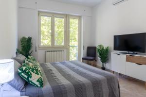 Postel nebo postele na pokoji v ubytování Appartamento Tartane