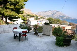 Fotografia z galérie ubytovania Apartments by the sea Duce, Omis - 2758 v Omise