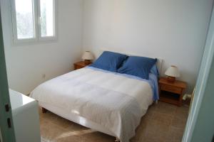 Postel nebo postele na pokoji v ubytování Maison individuelle avec vue sur mer - Les Lauriers
