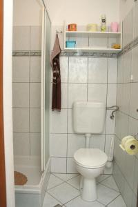 Kúpeľňa v ubytovaní Apartment Vrboska 4634b