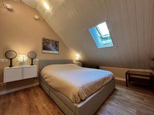 Letto o letti in una camera di La Baita Limone Riserva Bianca Ski-in Ski-out Seggiovia Morel 1
