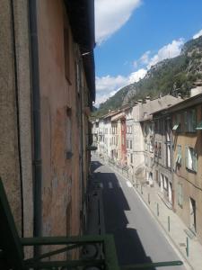 a view of a street from a building at Duplex meublé Mercantour in Fontan