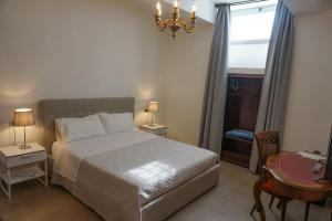 Postel nebo postele na pokoji v ubytování DreaMilan B&B