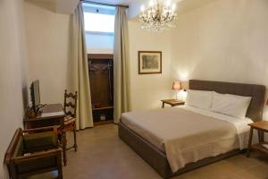 Postel nebo postele na pokoji v ubytování DreaMilan B&B
