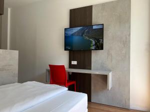 TV a/nebo společenská místnost v ubytování Wind Hotel