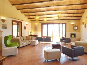 a large living room with couches and chairs at Mallorca Dream in Ses Salines