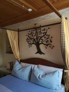 A bed or beds in a room at East Wind