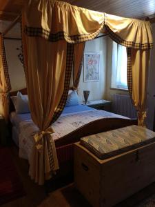 A bed or beds in a room at East Wind