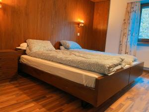 Voodi või voodid majutusasutuse Hotel Gemmi toas