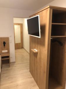 TV a/nebo společenská místnost v ubytování Pension Beil