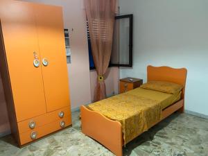 Ένα ή περισσότερα κρεβάτια σε δωμάτιο στο intero appartamento a Catanzaro Lido