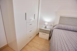Postel nebo postele na pokoji v ubytování VistAzul 402