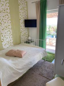 Posteľ alebo postele v izbe v ubytovaní Villa Androcec