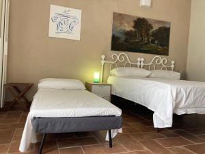 Voodi või voodid majutusasutuse Borgo Bruno toas