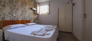 Postel nebo postele na pokoji v ubytování El Colmenar Apartamento