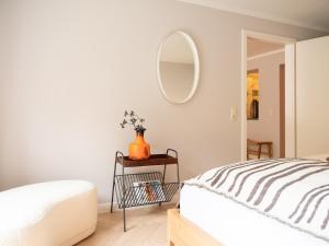 Ein Bett oder Betten in einem Zimmer der Unterkunft Das Sellin - Auszeit mit eigenem Seezugang und Sonnengarten