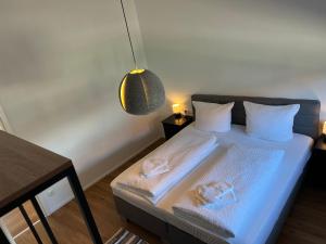 Postel nebo postele na pokoji v ubytování Allgäu SPA House