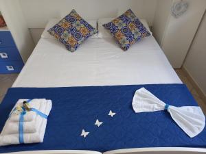 Postel nebo postele na pokoji v ubytování Villa Serena