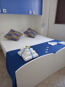 Postel nebo postele na pokoji v ubytování Villa Serena