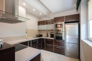 Kuchyň nebo kuchyňský kout v ubytování Apartament Andy Wisła + 8 fotografií