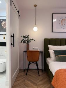 Postel nebo postele na pokoji v ubytování Apartament Na Krzywym Kole