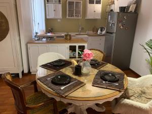 A kitchen or kitchenette at House Maximo at Colosseum