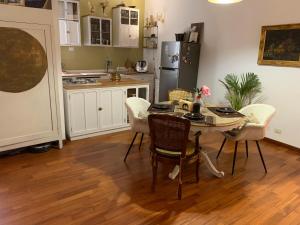 A kitchen or kitchenette at House Maximo at Colosseum
