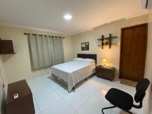 Postel nebo postele na pokoji v ubytování Bertolini Hotel