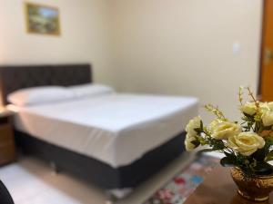 Postel nebo postele na pokoji v ubytování Bertolini Hotel